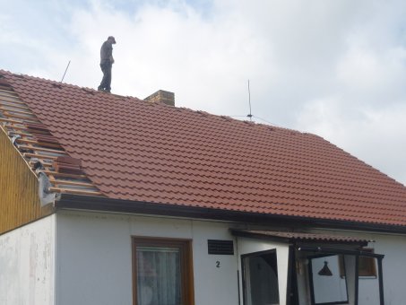 Pokládka plechové střechy